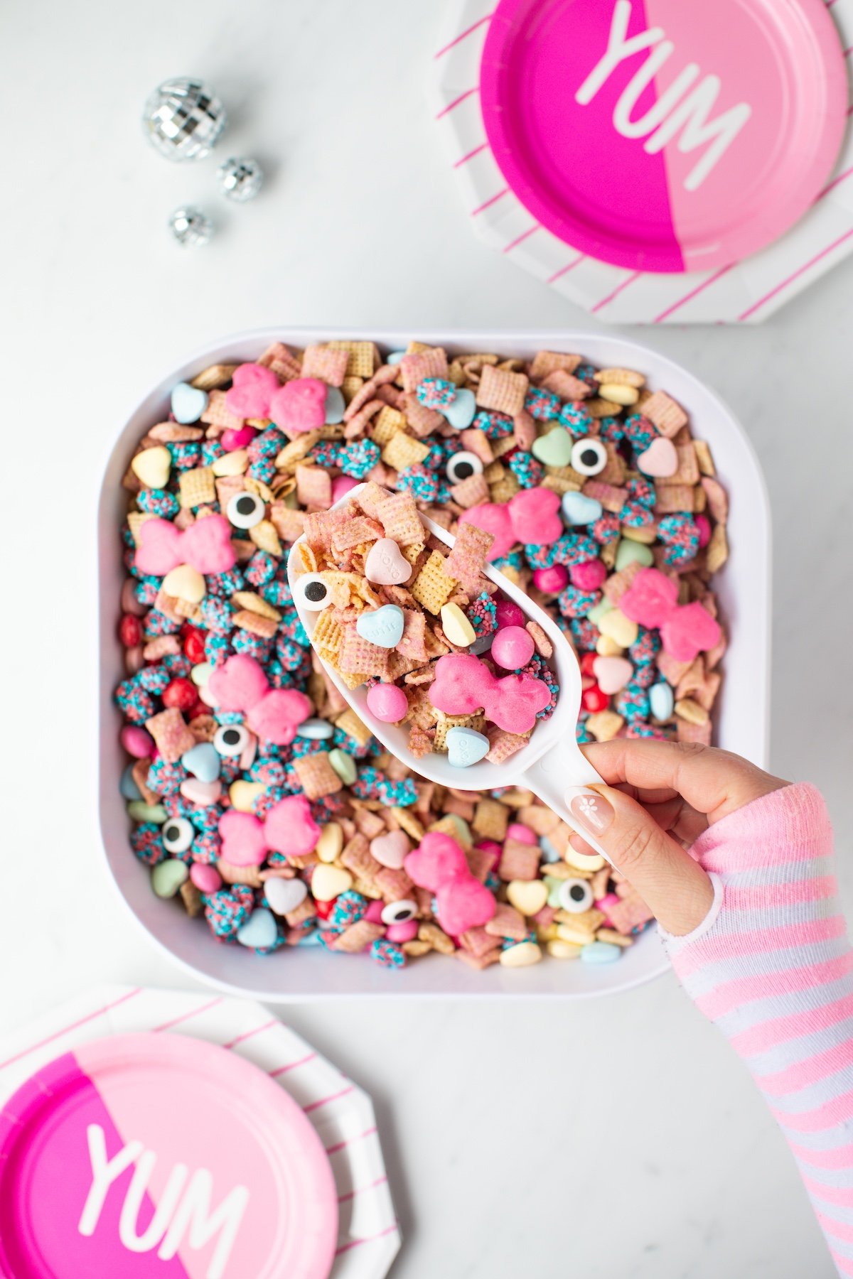 Monster High Snack Mix being scooped out of large dish.