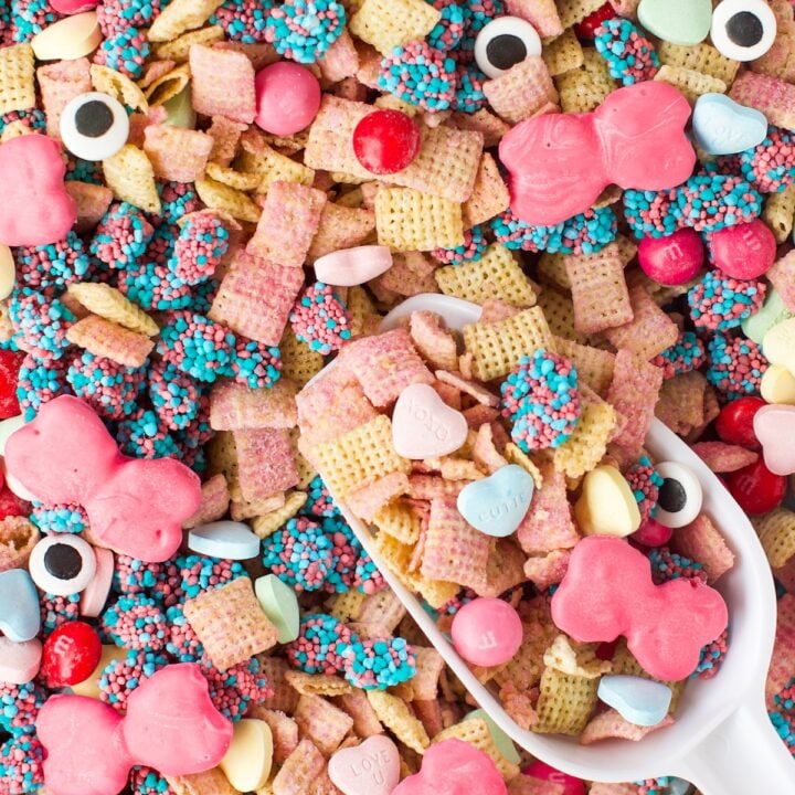 pretty Monster High Snack Mix with bright pink bow pretzels being scooped.