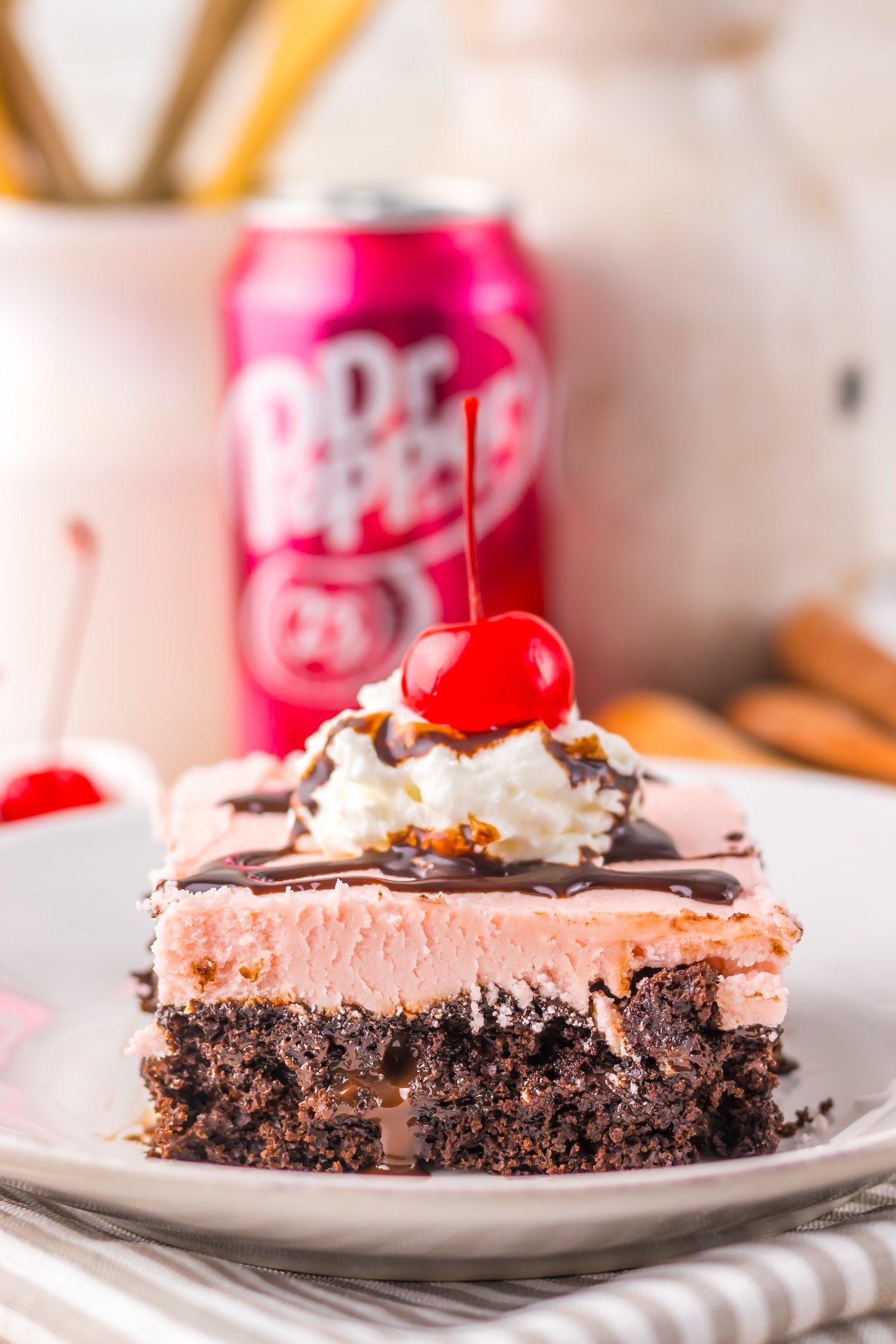 side view of dr pepper poke cake