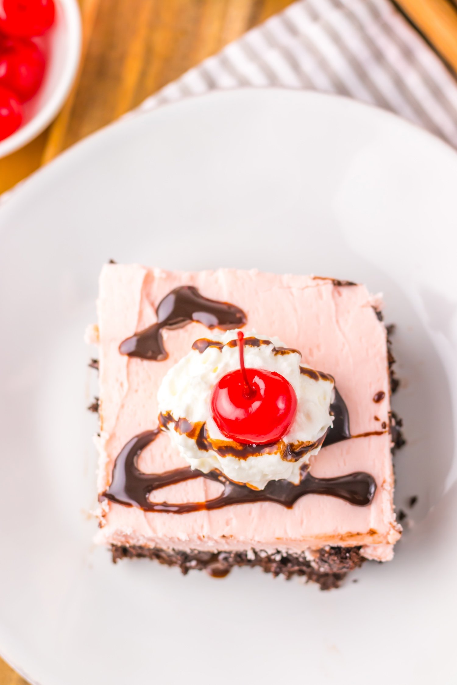 dr pepper poke cake on a white plate