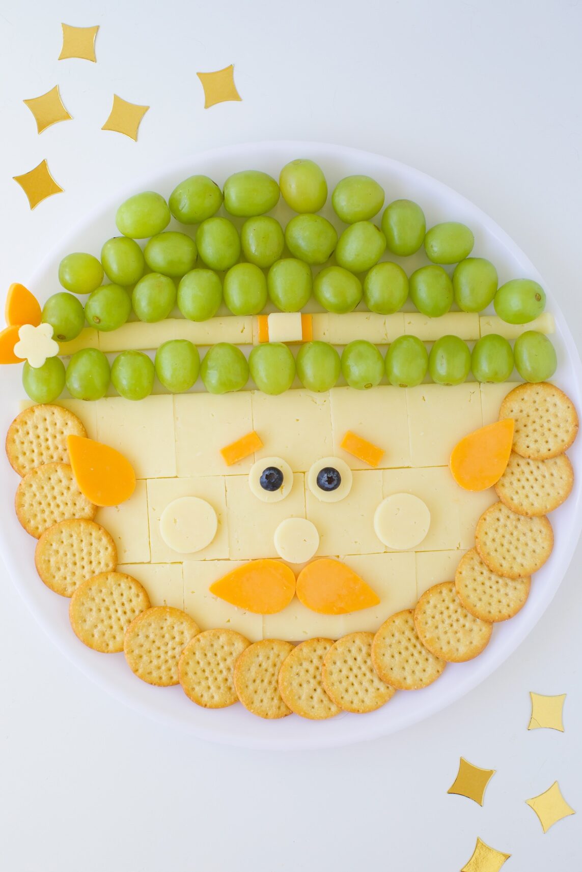 Leprechaun Cheese Board with cheese and grapes