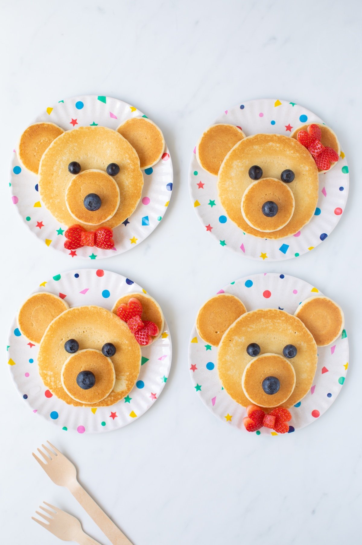 Cute bear pancakes with fruit embellishments