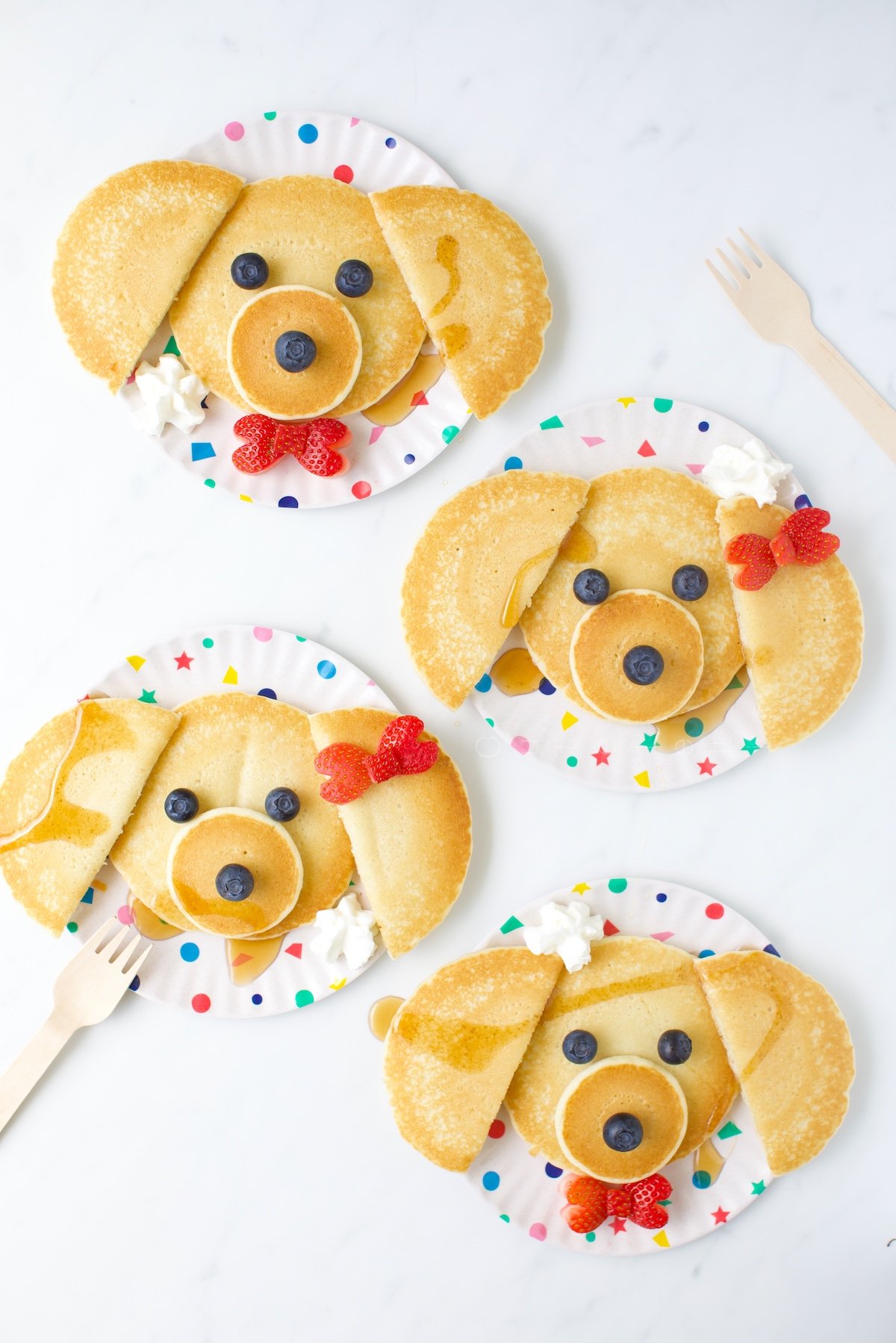 puppy pancakes with strawberry bowties and hair bows.