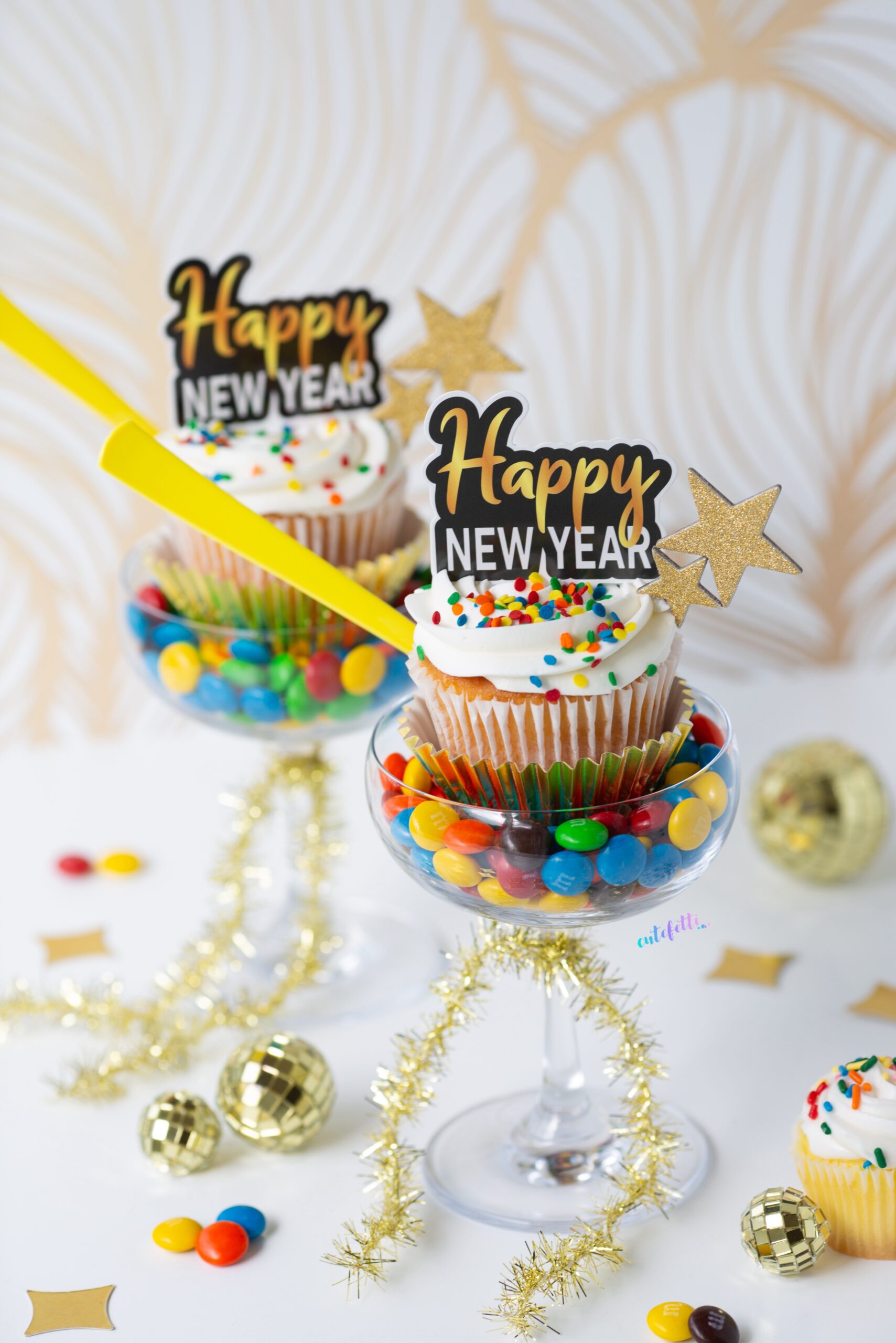 coupe glasses used to make new year's cupcake candy cups
