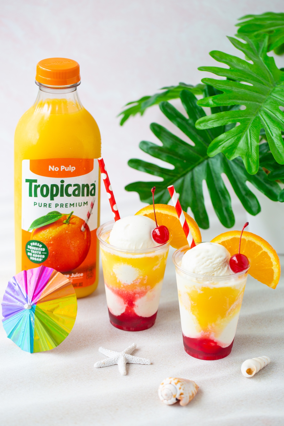 Cute Sunset Floats to celebrate summer. Made with OJ and ice cream.